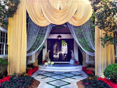 Gold drape with beaded curtain