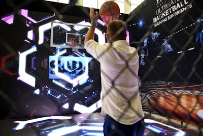 On a high-tech basketball court, SAP technology compared attendees’ skills to those of N.B.A. professionals.