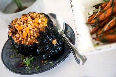 This acorn squash is stuffed with farro, sweet potato, parmesan, and pecans from Royal Fig Catering in Austin.