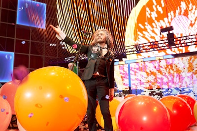 In one buzzy moment from Google I/O’s festival-style evening events, Wayne Coyne from the Flaming Lips performed a song accompanied by A.I.-enabled inflatable fruit.