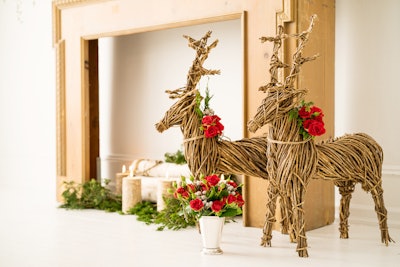 A holiday rooftop isn’t complete without some reindeer. Event design agency B Floral adorned these with petite roses and sprigs of greenery.