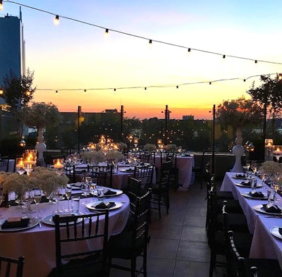 Twilit Rooftop Set for a Wedding Reception
