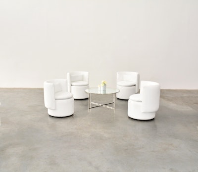 White velvet swivel chairs, $195 each, available in New York from Taylor Creative Inc.