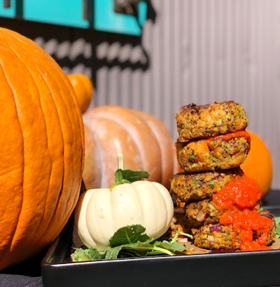 Pink Avocado Catering’s roasted pumpkin quinoa patties feature roasted pumpkin, quinoa, wild rice, caramelized onion, cranberry, roasted beets, seasonal herbs, and a red bell pepper coulis.