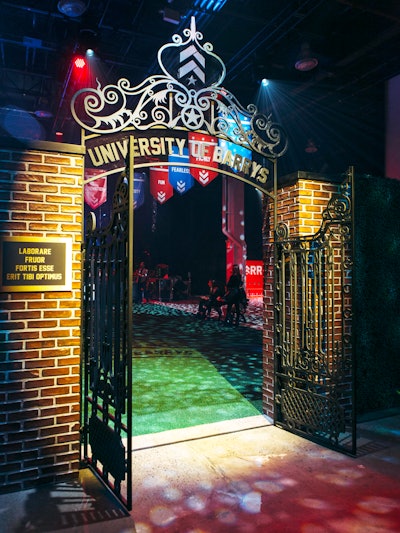 The quad featured a fabricated entry gate that was inspired by Johnston Gate at Harvard and included a bronze-esque plaque with Barry’s mission statement in Latin. Inside, benches lined the AstroTurf lawn.