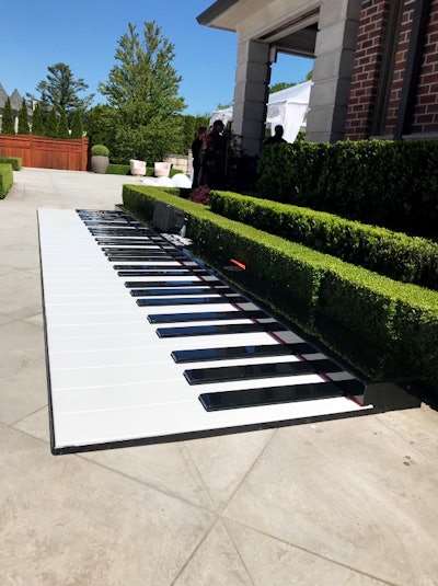 Abbey Road Entertainment, an event rental and entertainment company in Toronto, recently added the Giant Floor Piano to its catalogue. The oversized piano features keys lined with LEDs, which light up when guests step on them. The company also provides performers who play a number on the piano prior to opening up the floor to guests, and an attendant is on hand to show guests how to play basic music. Pricing is $2,750 (Cdn.) for up to four hours, plus delivery fees.