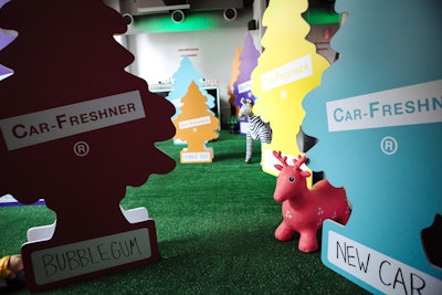 Additional details included car-wash air dancers and props designed to look like life-size hanging car deodorants. A few of the party staffers were also dressed as these decorations. See more: Summer Entertaining Ideas: a Car Wash-Theme Party