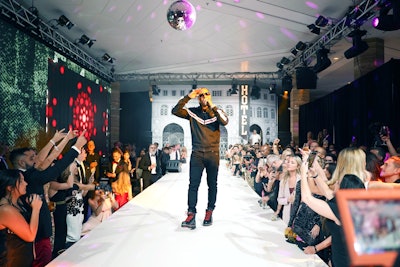 An after-party at E11even Miami featured a performance from rapper T.I. and a nightclub-like runway fashion show.