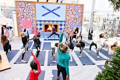 Apparel brand Athleta hosted morning yoga sessions including a special “Mom & Me” class and a traditional vinyasa flow class at the chalet. Attendees received a complimentary Manduka yoga mat and could shop the brand’s holiday collection on site.