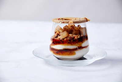 Caramelized pear and fig trifle with brandied mascarpone cream and rosemary olive oil cake, garnished with toasted almond nougatine and spiced shortbread crunch, by Abigail Kirsch in New York