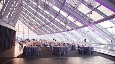 The Daniel F. and Ada B. Rice Solarium set up for a seated dinner