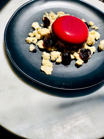 Coconut mascarpone mousse with amaretti cookies, amarena cherry, and cherry compote, by Limelight Catering in Chicago