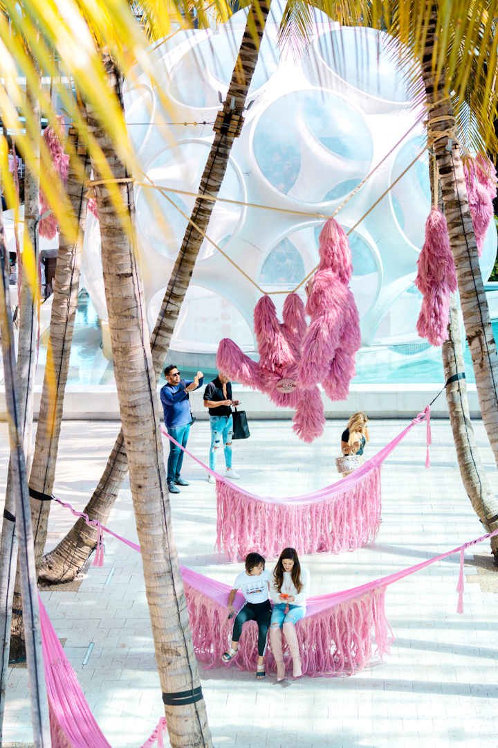 Pink Beasts was in collaboration with designer Angela Damman, who constructed 10 hammocks for public use. Guests interacted with the exhibit in the Design District throughout the week.