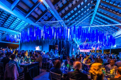 For the Parrish Art Museum benefit, which was held in Watermill, New York, in July 2017, Ovando drew inspiration from the work of one of the honorees, Clifford Ross. The custom-crafted ceiling treatment aimed to transport the guests into the ocean, using hundreds of panes of different shades of blue polypropylene. See more: 18 Cool Ideas From Summer Benefits