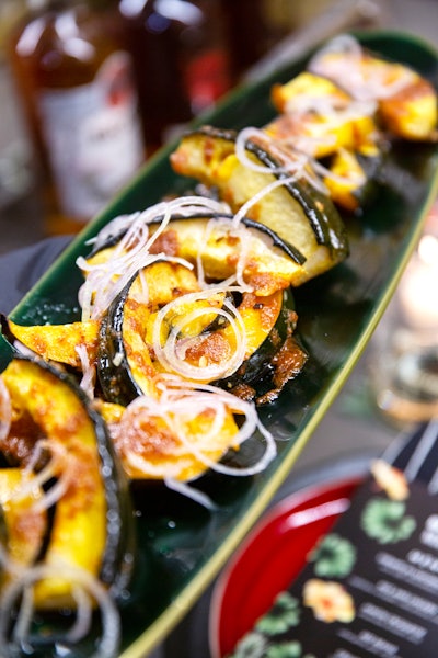 The family-style dishes served inside included grilled squash with maple syrup.
