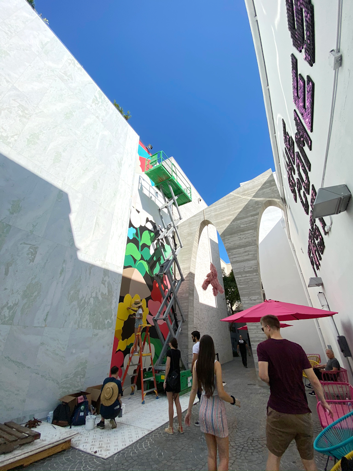 Husband-and-wife artists DabsMyla of Los Angeles painted a psychedelic mural in the Design District in collaboration with Perrier.