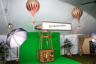 A photo booth with a green screen made it look as if guests were in a flying hot air balloon.