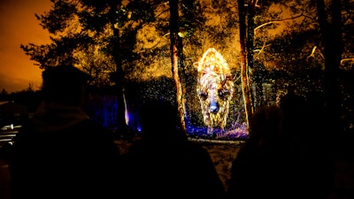 Terra Lumina, a futuristic night walk at the Toronto Zoo, opened on December 13. The 1.5-kilometer walk features lighting, visual effects, and projections designed to transport guests to the year 2099, when “humans have learned to live in harmony with nature and wildlife.” The experience was created by Montreal-based multimedia studio Moment Factory.