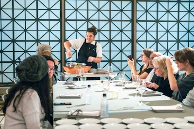 As guests arrived, they were each given a team number that indicated when they should sit at the table. Each seated session included four courses, and chefs stood by to explain their inspiration for the dish.