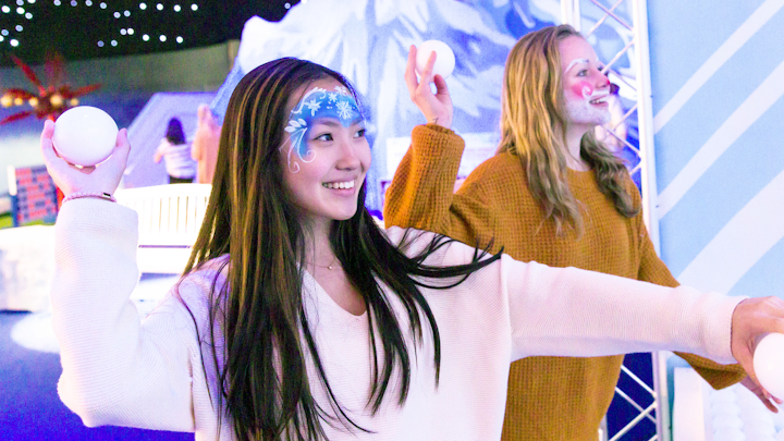 Santa's Fantastical, an immersive holiday experience in Atlanta, invited guests to explore themed rooms and participate in various winter-inspired activities, including Snowpalooza, a digital game that involved tossing snowballs at a screen of animated snowmen. The ticketed experience was the brainchild of local entrepreneurial couple Walt Geer and Sarah Blackman, who teamed up with PictureU to bring the innovative idea to life inside a 39,000-square-foot space.