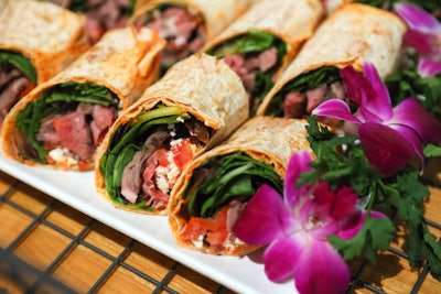 Other after-party dishes include a laffa wrap (pictured), cucumber and tomato salad, and roasted beet salad.