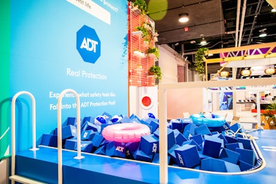 The ADT booth also had a foam pit activation dubbed the “Trust Fall Pool.” A slow-motion camera captured attendees falling into the pit; the videos could instantly be shared on social media.