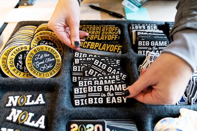 Guests could decorate their clear stadium backpacks, cross-body bags, and fanny packs with custom patches that included conference affiliations as well as several New Orleans-inspired and playoff-branded designs.