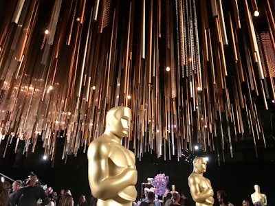 This year's event design will be inspired by the concepts of 'harmony and relaxation,' with a color palette of copper and bronze metallics with accents of eggplant and amethyst. Overhead will be a floating chandelier made from 2,000 tubes of light, all constructed from recycled materials in varying finishes and textures.