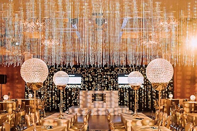 In October 2018 at the Mandarin Oriental in Boston, Tyger Productions created a glam Art Deco atmosphere for the UnMask Cancer benefit, which supports the Dana-Farber Cancer Institute and the Jimmy Fund. Large 24-inch crystal spheres on tall gold pedestals punctuated the room, along with a waterfall curtain of cut crystal from above.
