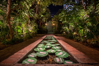 Floating leaves printed with the car company's logo added an eye-catching touch to the pool.