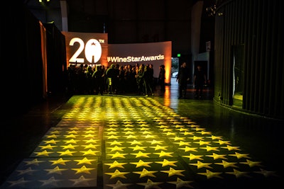 For the 20th anniversary of its annual Wine Star Awards, which took place this January in San Francisco, Wine Enthusiast paid tribute to the last two decades of winners—most notably through an eye-catching Walk of Fame-style entryway that featured the names of past recipients in stars on the ground. The evening’s #WineStarAwards hashtag was prominently displayed above the walkway, reminding guests to use the tag when posting the social-friendly moment. See more: How This Gala Put Its Honorees Front and Center at a Milestone Event