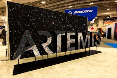 NASA celebrated Artemis, its new lunar exploration program, with a crowd-sourced activation at the International Astronautical Congress in Washington in October 2019. The 15-foot-long sculpture depicted the Artemis logo composed of 3,000 user-generated photos that had been submitted through Instagram and Twitter with the hashtag #NASAExhibit. Images were printed on site, and event guests applied them to the sculpture. The activation marked the debut of technology company Luster's Mosaic Sculptures, which are life-size art installations created from hashtagged social-media posts. See more: How NASA Created a Sculpture Made From Thousands of Selfies