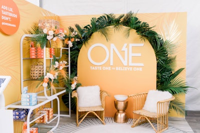 Snack bar company One created a lounge area with a tropical feel thanks to a soft yellow hue.