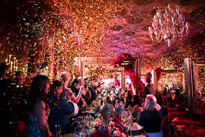 At the end of the third course, after a yodeler sang happy birthday, waiters released a series of confetti canons.