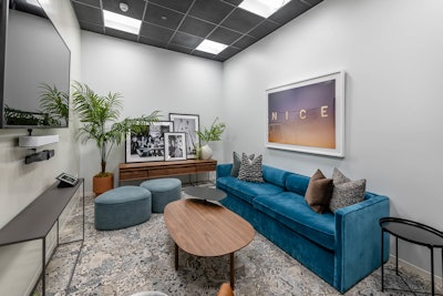 At NVE, several conference rooms are designed for brainstorming sessions with couches, plants, and artwork.