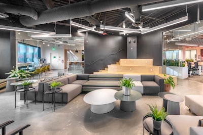 At NVE, a large corner room known as 'the arena'' has stadium-style seating, plus audiovisual technology to allow for live streaming, concerts and presentations, and internal and client events.