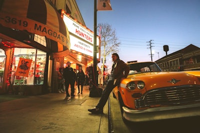 Amazon Prime Video transformed an entire block in Highland Park using period cars, costumed performers, and other props. For a screening, Highland Theatres became 'The Empire,' a throwback space inspired by New York's old-school grindhouse theaters.