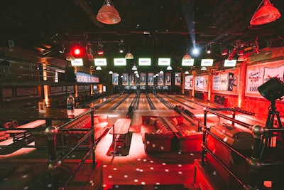 The popular bowling alley—the oldest alley in Los Angeles—was transformed with branded bowling balls, photos of the actors, and New York City-inspired food such as pizza and latkes.
