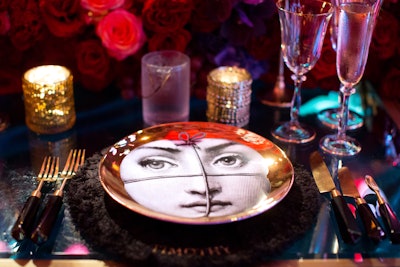 The place settings used plates from Italian artist Piero Fornasetti.