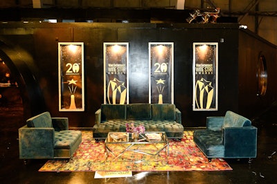The after-party space featured large signage that depicted the evening's star-shape trophy.