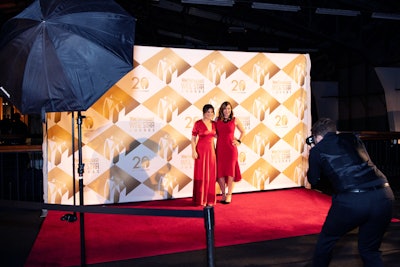 The gala's step-and-repeat featured a simple, diagonal pattern that complemented the star-shape award.