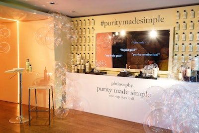 In the Purity Made Simple Room, guests interacted with a hands-on beauty bar stocked with sample cleanser. Eventique emphasized the product's refreshed branding with top-to-bottom bubble-like decor. On the screen flashed a selection of the product's 11,000-plus positive reviews.