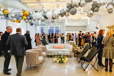 Party Poppers outfitted the event's venue, Asterisk, with white, silver, gold, and metallic balloons as a nod to the 'golden years of the future' theme.