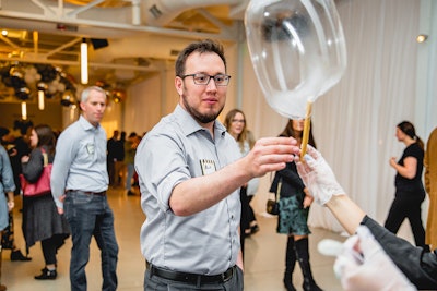 A Custom Look Events set up a station that offered guests edible balloons on a cookie straw.