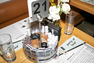 The new products, which were on display at each table, included color-intensifying eye primers, eyeshadows, lipsticks, concealers, and more.