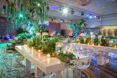 Fairmont Chicago was draped in shades of green via live plants and colored furnishings for the 2017 Pantone Color of the Year event, where Kehoe Designs helmed the event's design. Running with a Greenery theme—Pantone's then-color of the year—the event design team incorporated appropriately colored products from the client's product line, such as green mop heads, which were used to form the oversize, makeshift weeping willow trees. 'Working with sister company Floral Exhibits, the event producers were able to make it appear as if living plants were growing right out of the tables themselves,' said Joey Berman, senior event producer at Kehoe Designs.