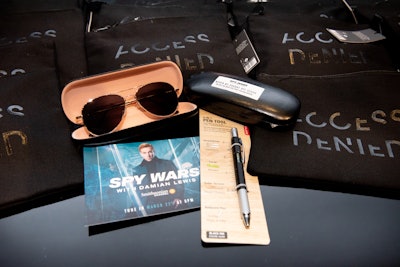 Guests received a branded bag filled with spy tools such as rearview aviator sunglasses; a spy pen; and a travel pouch with an R.F.I.D.-blocking feature to protect their identity.