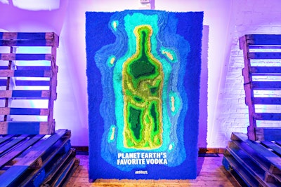 An installation promoting the campaign depicted the Absolut bottle as land surrounded by water. The wall was created entirely with recycled straws. See more: See an Absolut Bar That Accepted Recyclables as Currency