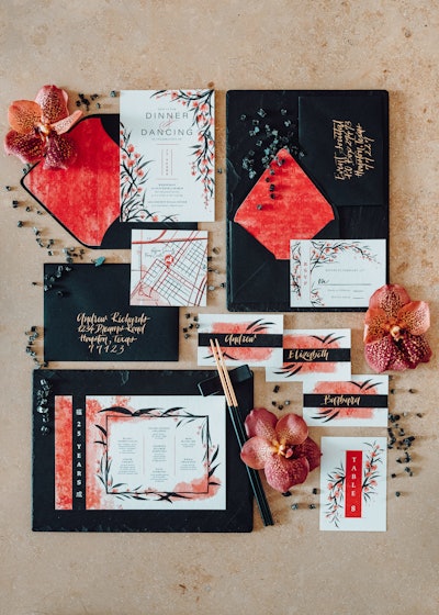 “Before getting started, I thought about what elements would tie in with an Asian-inspired theme—cherry blossoms, free-flowing ink, vertical written orientation, and red as a signature color for luck,” explained Ashley Presutti Beasley of Presutti Design about the look of the collateral materials. “More specifically, Mulan was feminine, yet bold. Rather than focusing on being delicate, light, and airy, I wanted to ensure that the design stood out as strong and unexpected.”