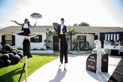 First up was 'Grad at the Pad,' a celebration for the class of 2020 that took over a front yard in Orange County, Calif. 'Instantly my mind went to entertainers on stilts,' said event designer Alexandra Rembac, nodding to the requirements to stay six feet apart from others.